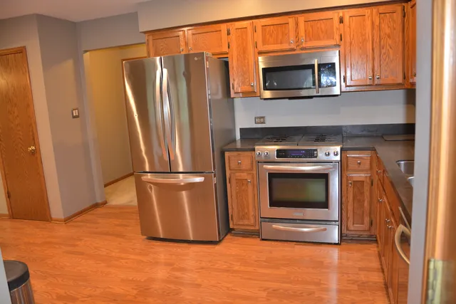 a bathroom with a shower and a toilet