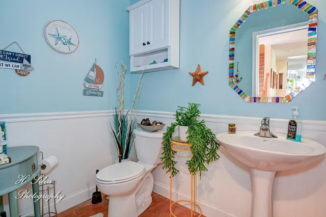 a spacious bedroom with a bed and a couch