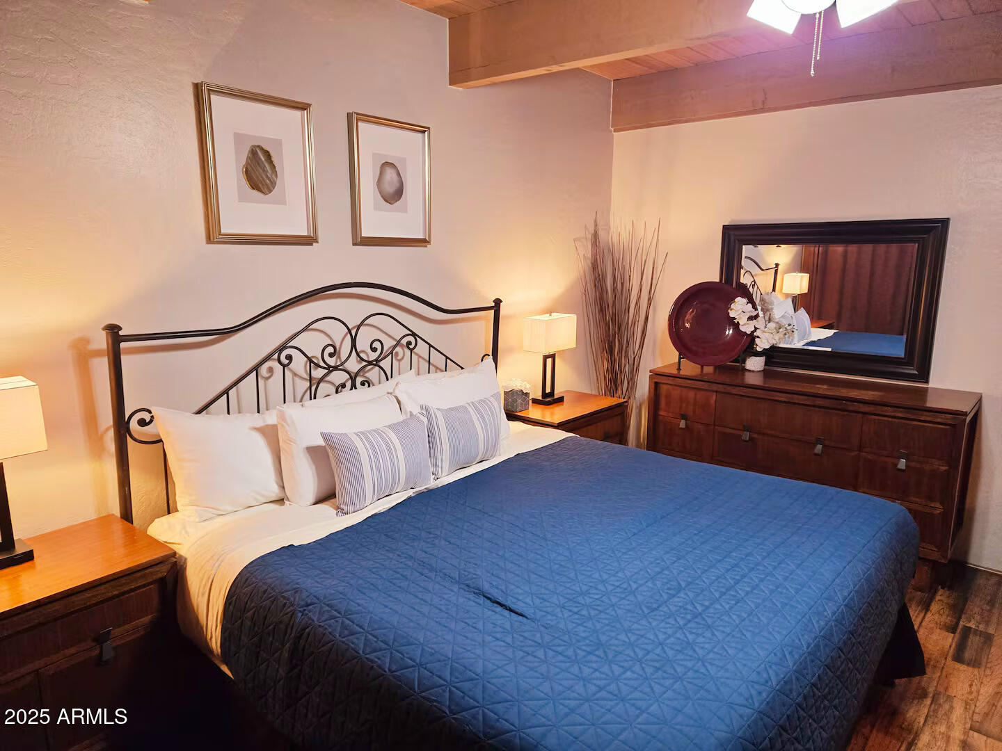 8351 North State Rte 89A, Unit 33 Sedona, AZ 86336 - Photo 13 of 41 a bedroom with a bed and dresser