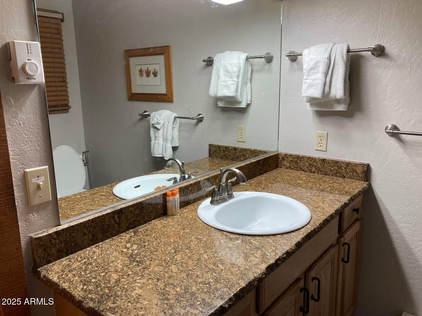 8351 North State Rte 89A, Unit 33 Sedona, AZ 86336 - Photo 18 of 41 a bathroom with a sink granite and a mirror