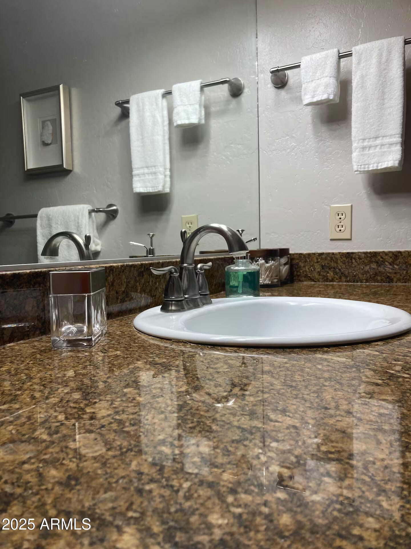 8351 North State Rte 89A, Unit 33 Sedona, AZ 86336 - Photo 19 of 41 a bathroom with a sink and a mirror