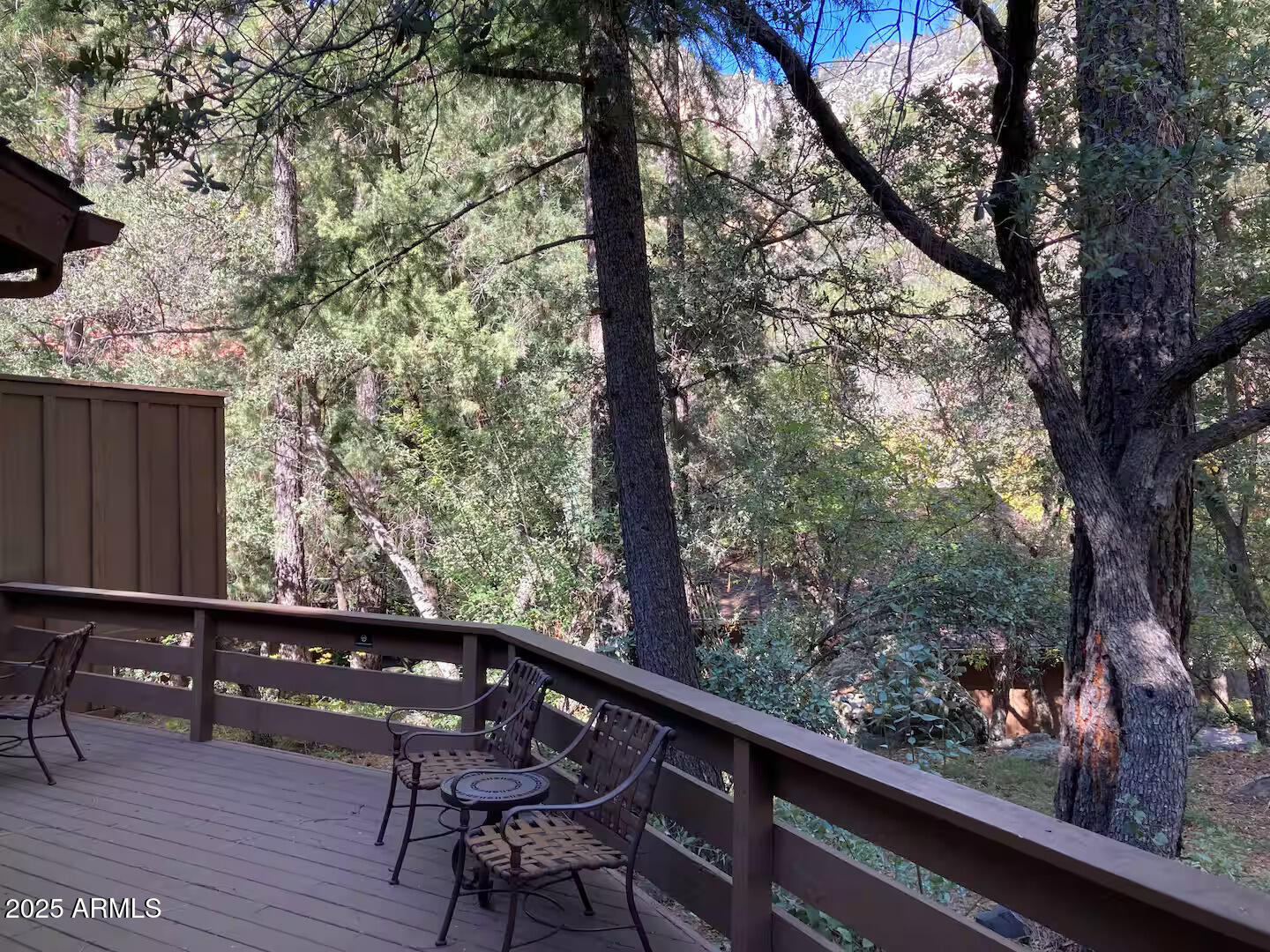 8351 North State Rte 89A, Unit 33 Sedona, AZ 86336 - Photo 24 of 41 a view of balcony with wooden floor and outdoor seating
