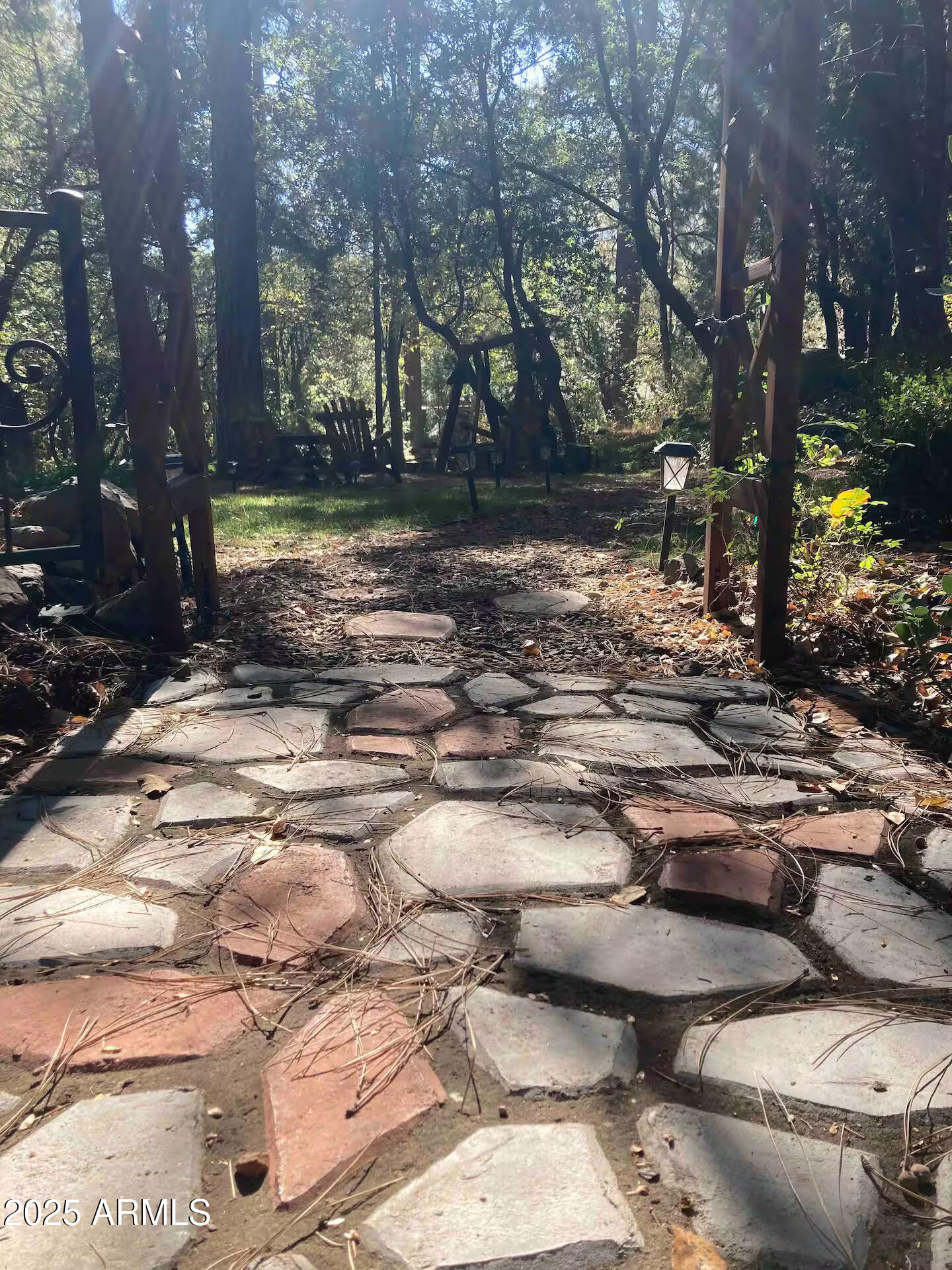 8351 North State Rte 89A, Unit 33 Sedona, AZ 86336 - Photo 26 of 41 a view of a yard with plants and trees
