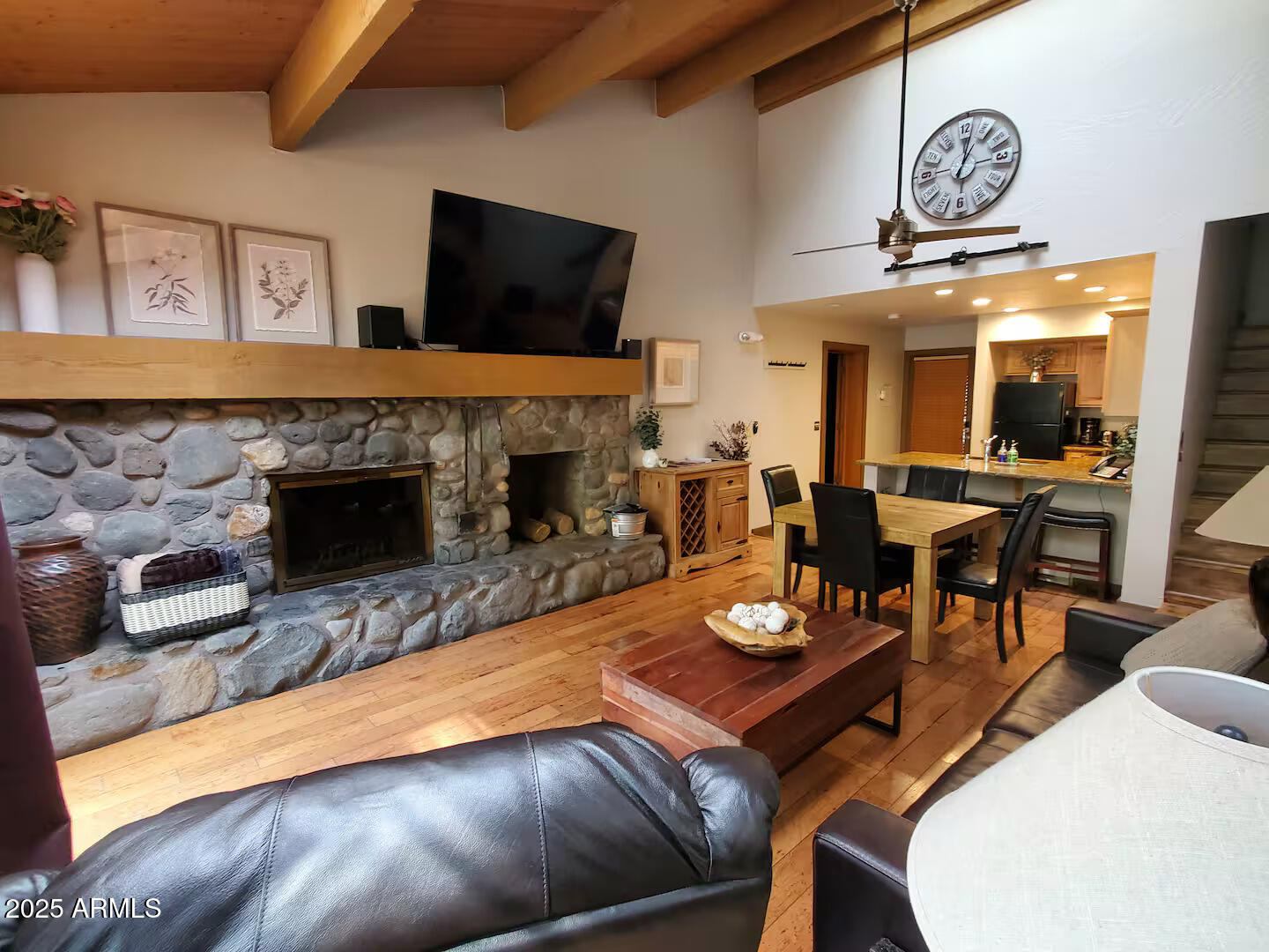 8351 North State Rte 89A, Unit 33 Sedona, AZ 86336 - Photo 6 of 41 a living room with furniture and a fireplace