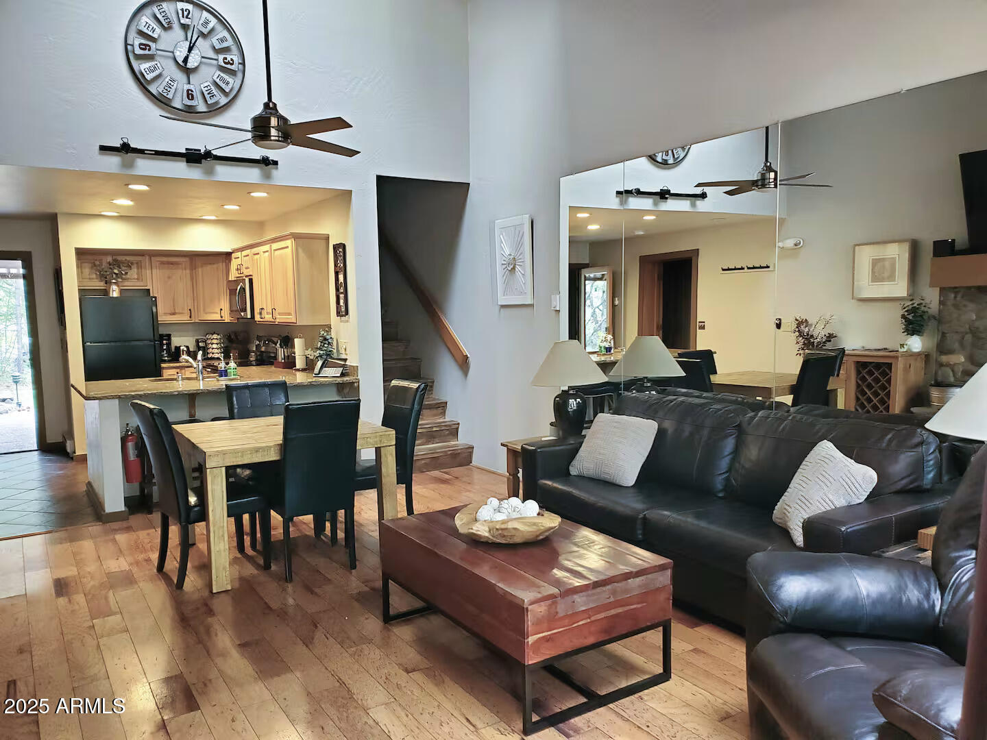 8351 North State Rte 89A, Unit 33 Sedona, AZ 86336 - Photo 8 of 41 a living room with furniture and wooden floor