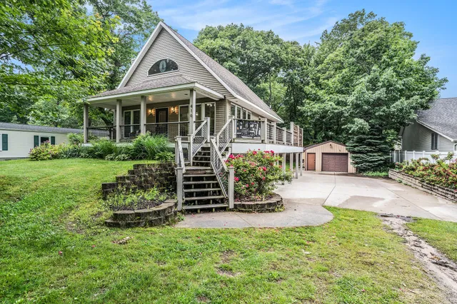 $449,900 | 410 North Spencer Road, Mears, MI 49436