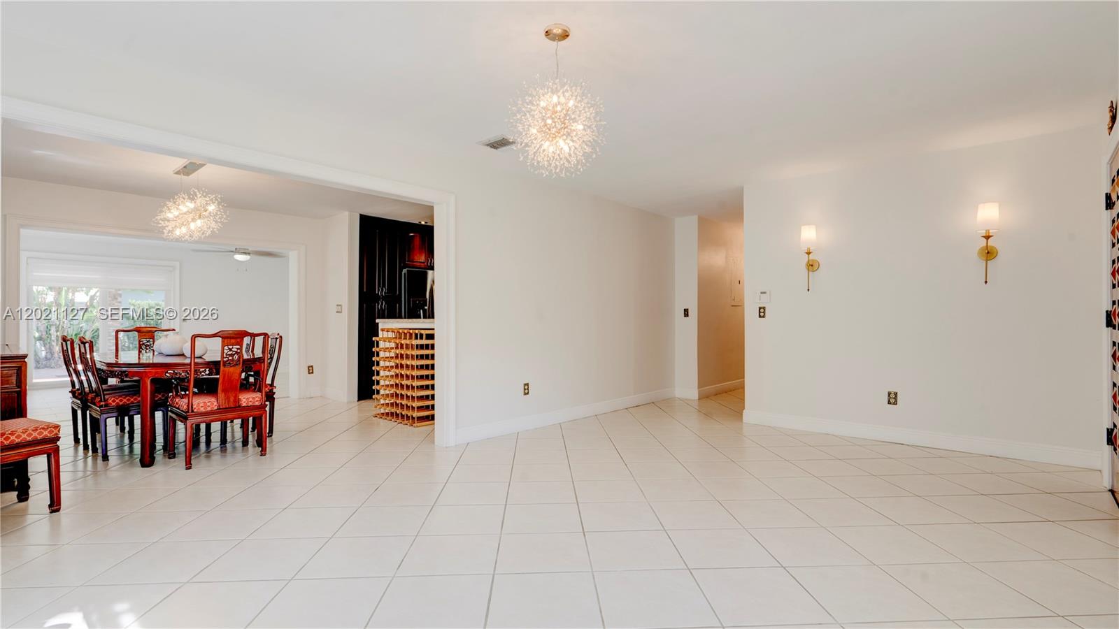 3611 Southwest 23rd Street Miami, FL 33145 - Photo 8 of 56 3613 view from entrance to living room, dining room and kitchen