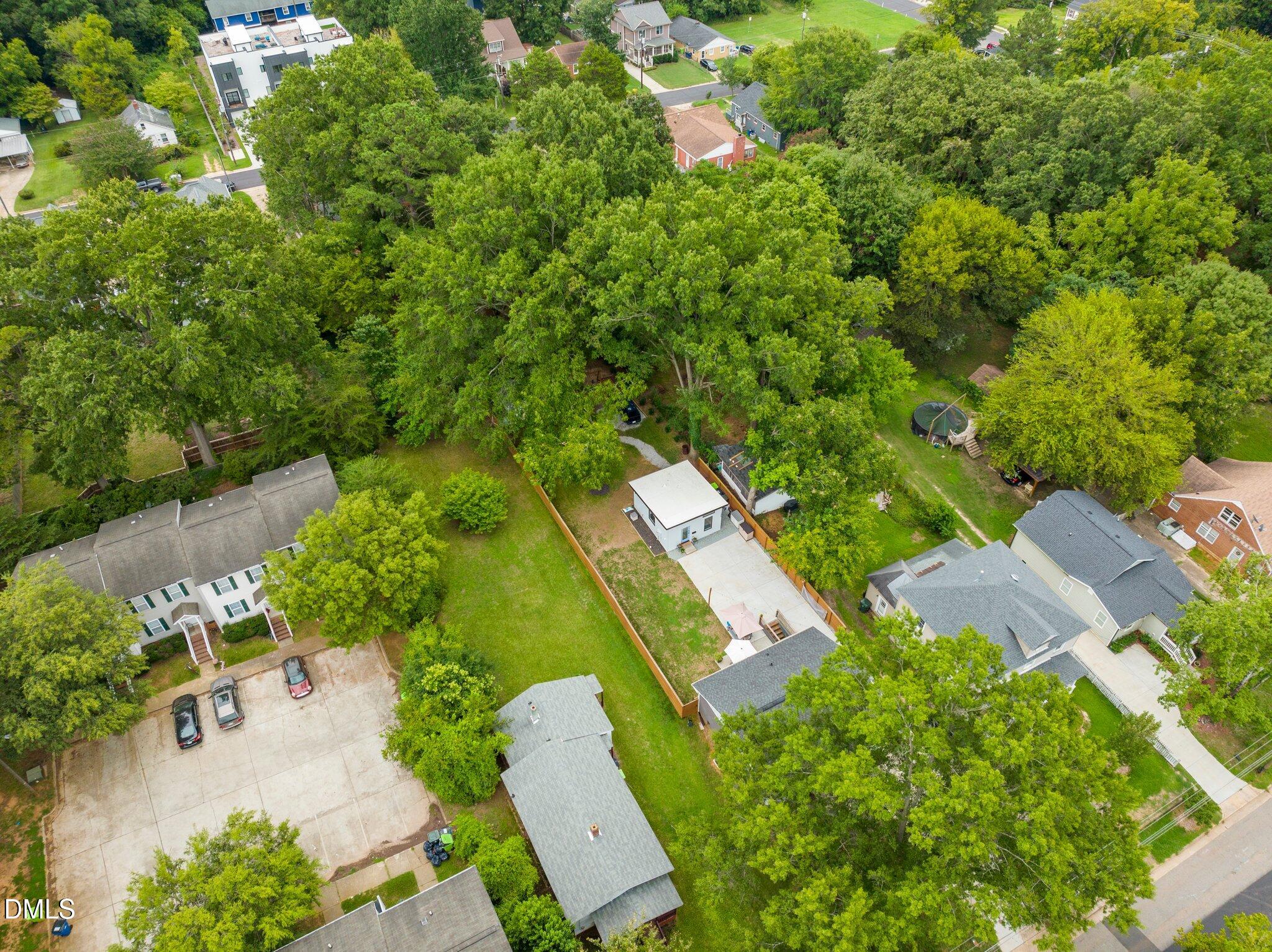 1023 Holmes Street Raleigh, NC 27601 - Photo 39 of 41 an aerial view of residential houses with outdoor space