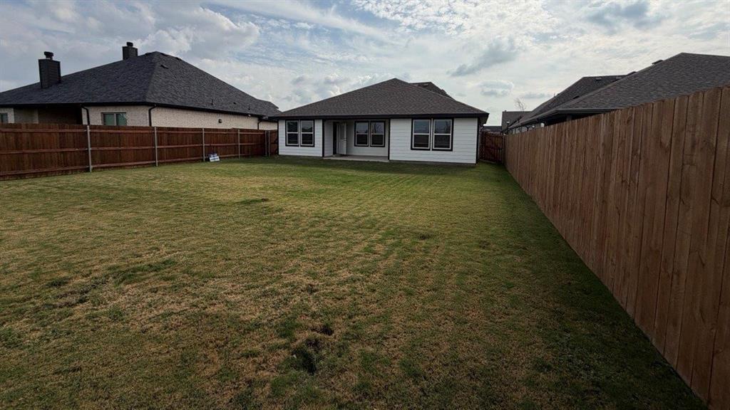 1704 River Bend Road Burleson, TX 76028 - Photo 14 of 19 a view of a house with a yard