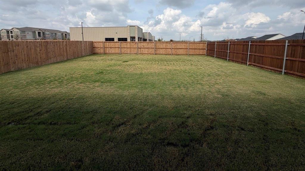 1704 River Bend Road Burleson, TX 76028 - Photo 18 of 19 a view of a backyard