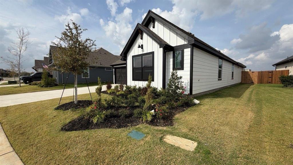 1704 River Bend Road Burleson, TX 76028 - Photo 1 of 19 a view of a house with a yard