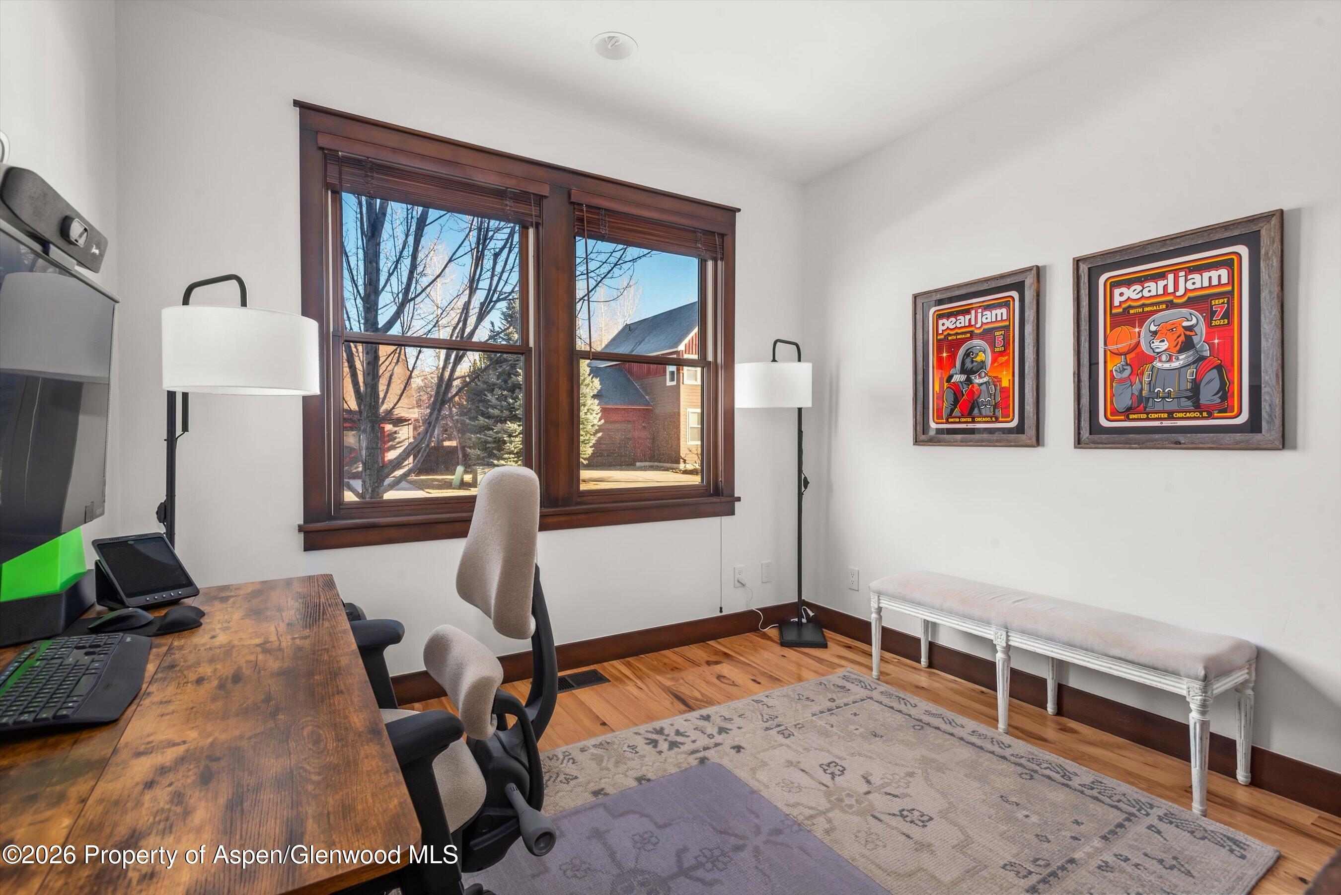 410 Meadow Court Basalt, CO 81621 - Photo 28 of 30 a room with furniture piano and a window