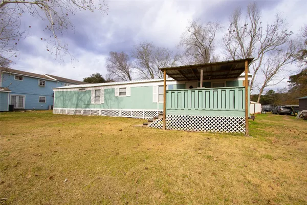 a view of a house with a garden