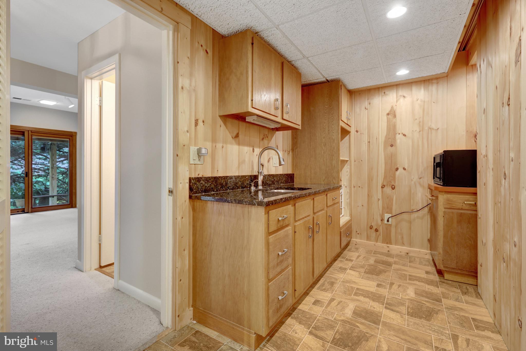 11088 Glade Court Reston, VA 20191 - Photo 44 of 75 a bathroom with a sink and a mirror