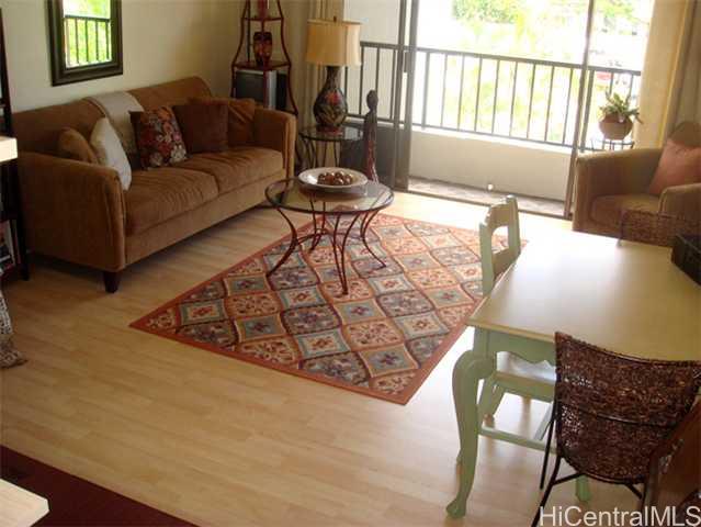 500 Lunalilo Home Road, Unit 33D Honolulu, HI 96825 - Photo 1 of 1 a living room with furniture and a large window