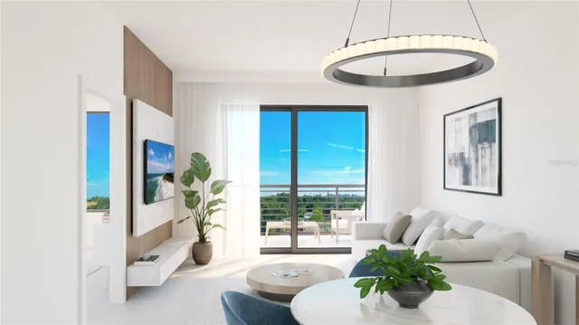 a living room with furniture and a table