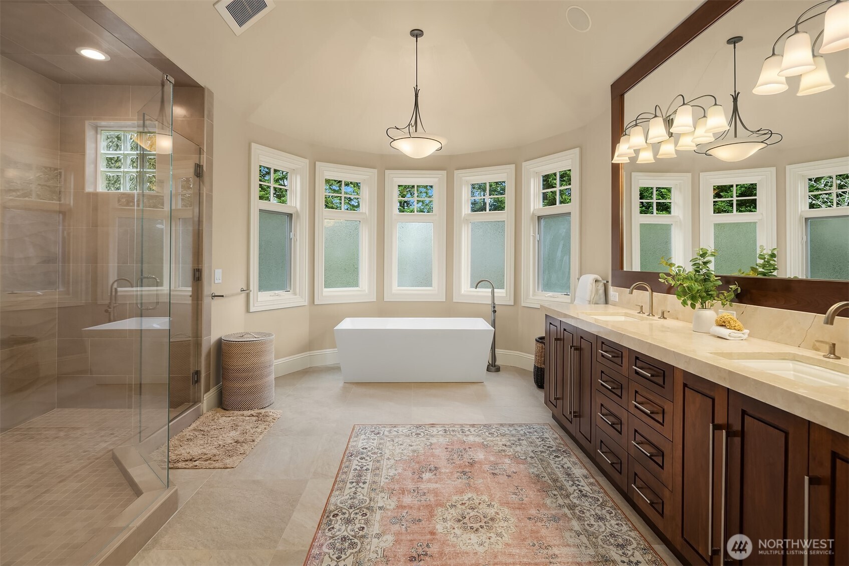 9 Diamond Ranch South Bellevue, WA 98004 - Photo 17 of 26 a spacious bathroom with a double vanity sink a large mirror and a bathtub