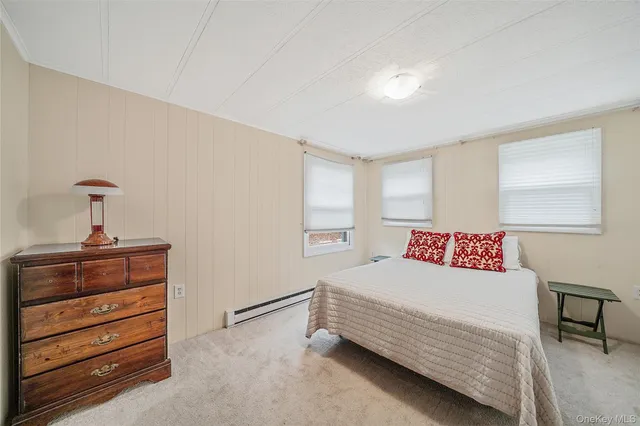 a hallway with washer and dryer