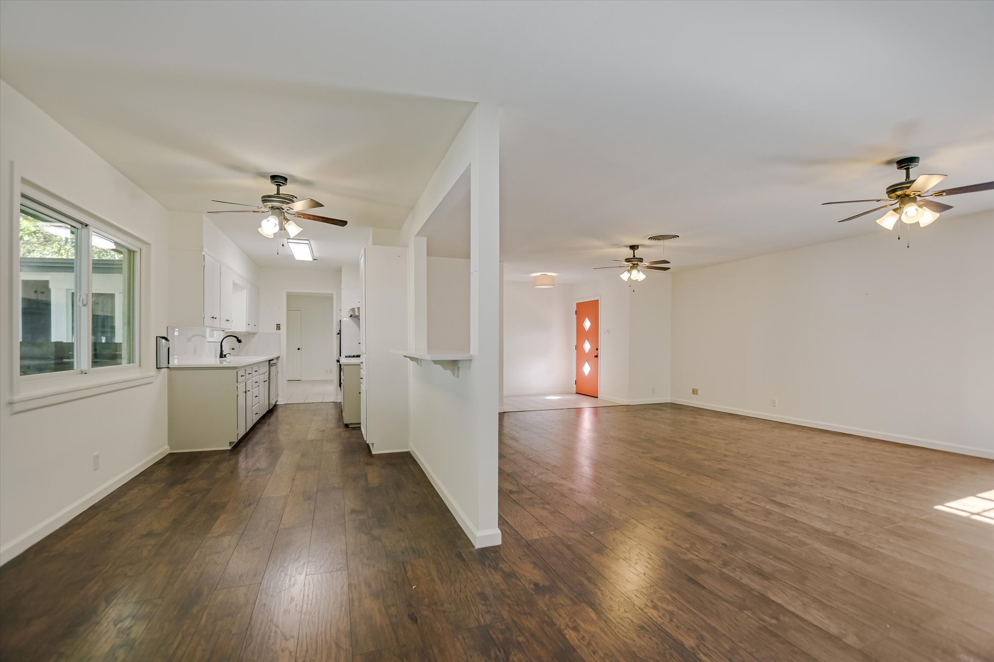 1601 East 19th Street Georgetown, TX 78626 - Photo 31 of 31 wooden floor in an empty room with a window