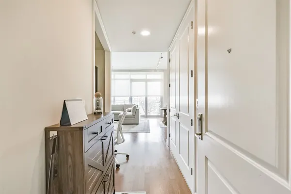 a view of a hallway with a couch