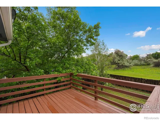 a view of deck with a bench