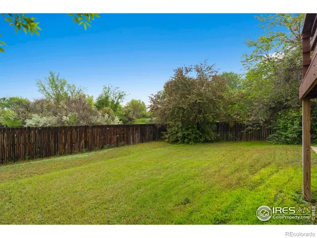 a view of a backyard with a garden