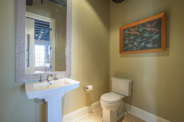 a bathroom with a sink and a toilet