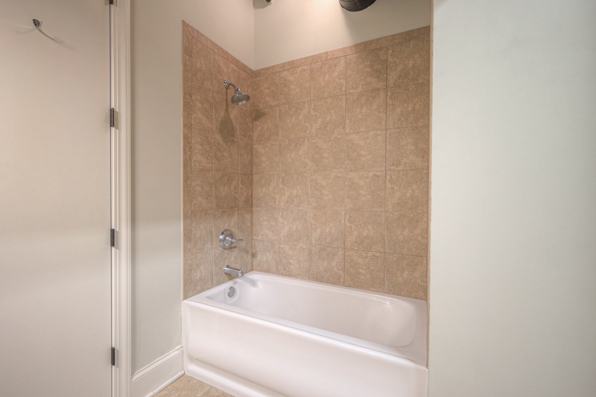 320 Liberty Pike, Unit 214 Franklin, TN 37064 - Photo 29 of 53 a bathroom with a tub and shower