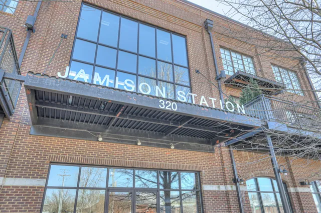 a view of a chairs and table in patio