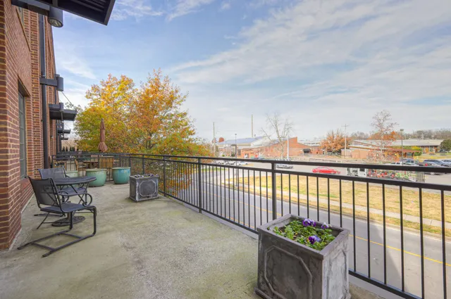 a view of a terrace with outdoor seating