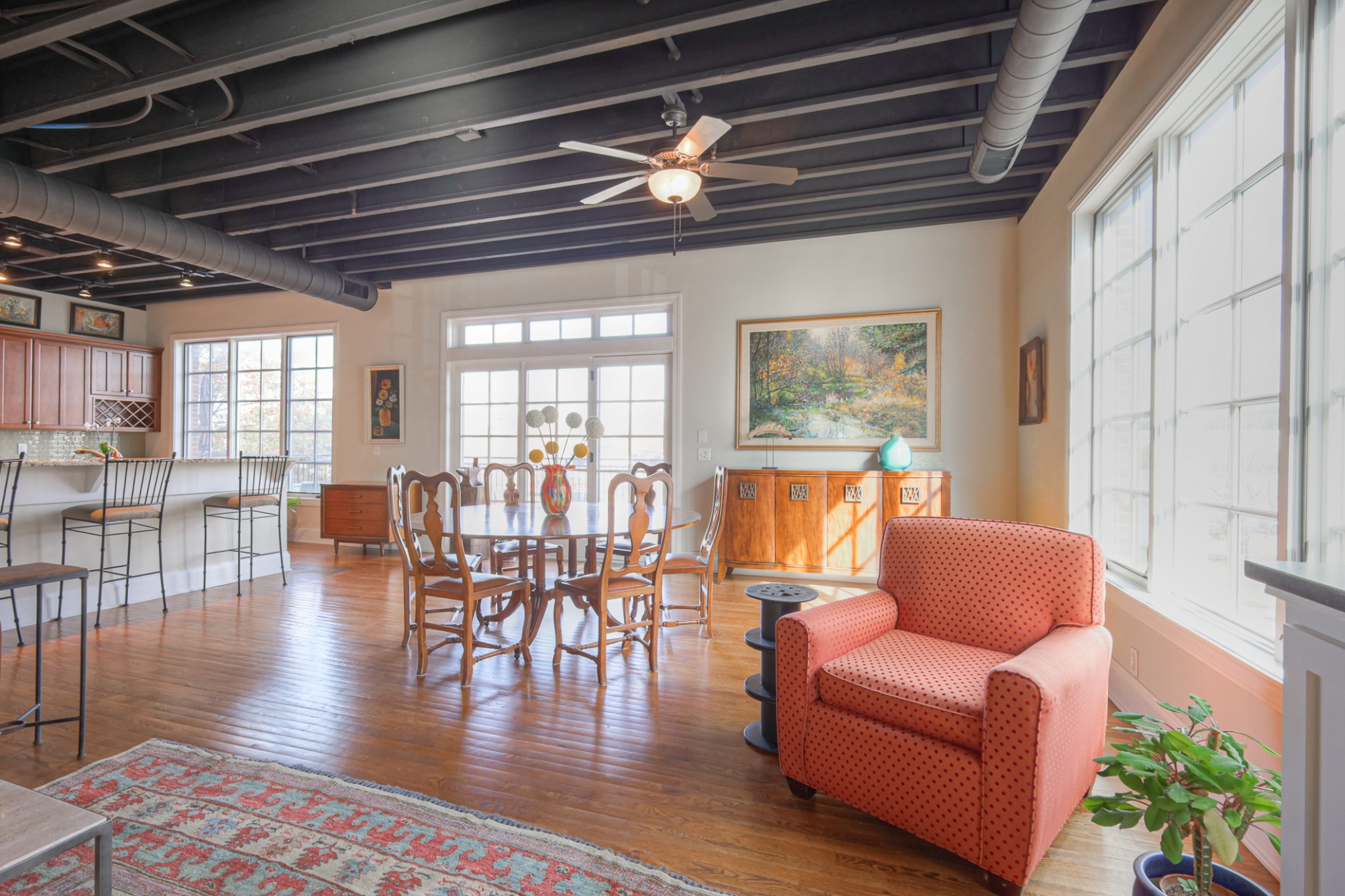 320 Liberty Pike, Unit 214 Franklin, TN 37064 - Photo 6 of 53 a living room with furniture wooden floor and dining table