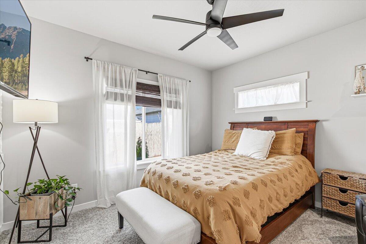 248 Christopher Way Talent, OR 97540 - Photo 12 of 33 a bedroom with a bed and a window