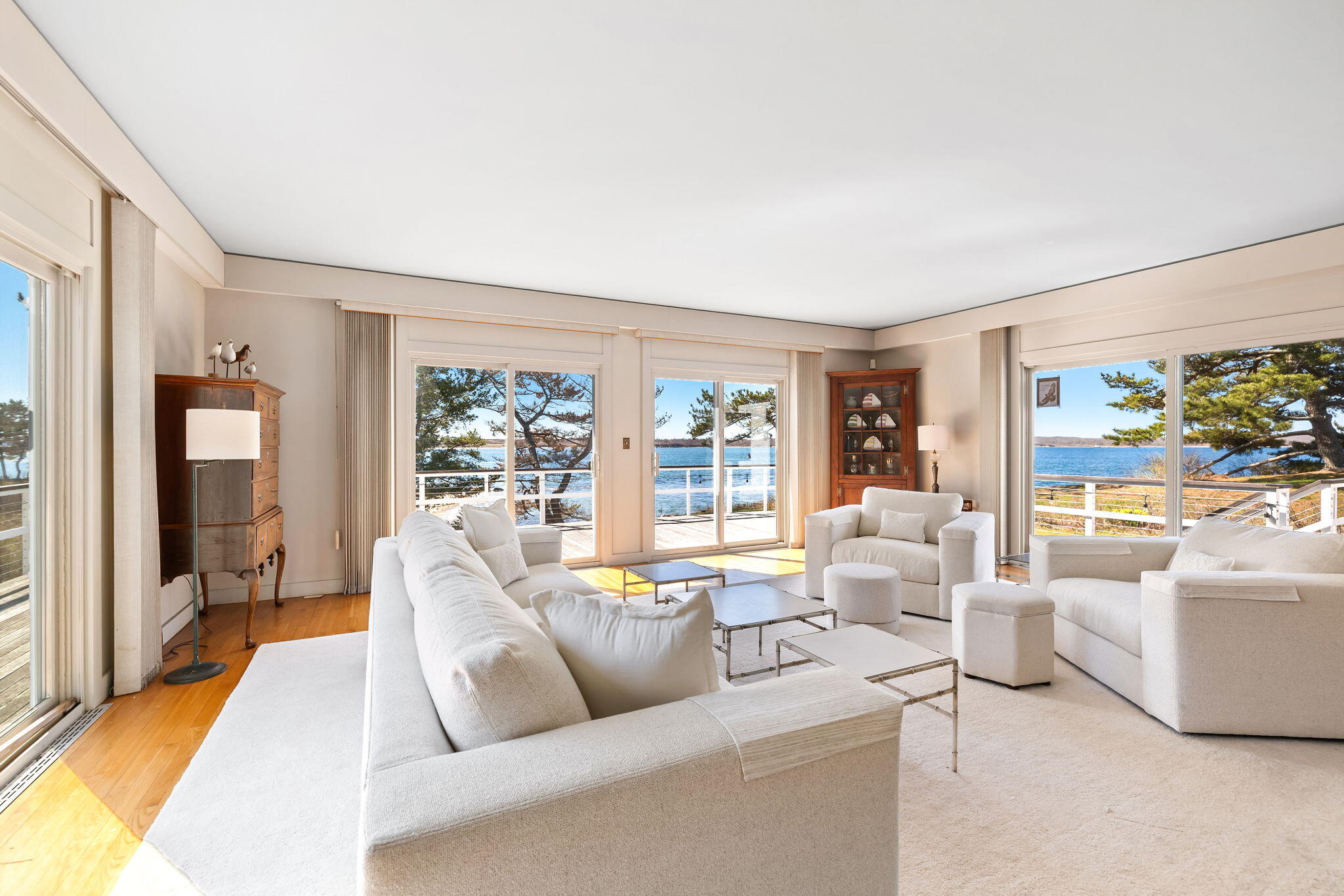 169 Penzance Road Woods Hole, MA 02543 - Photo 11 of 41 a living room with furniture and a large window