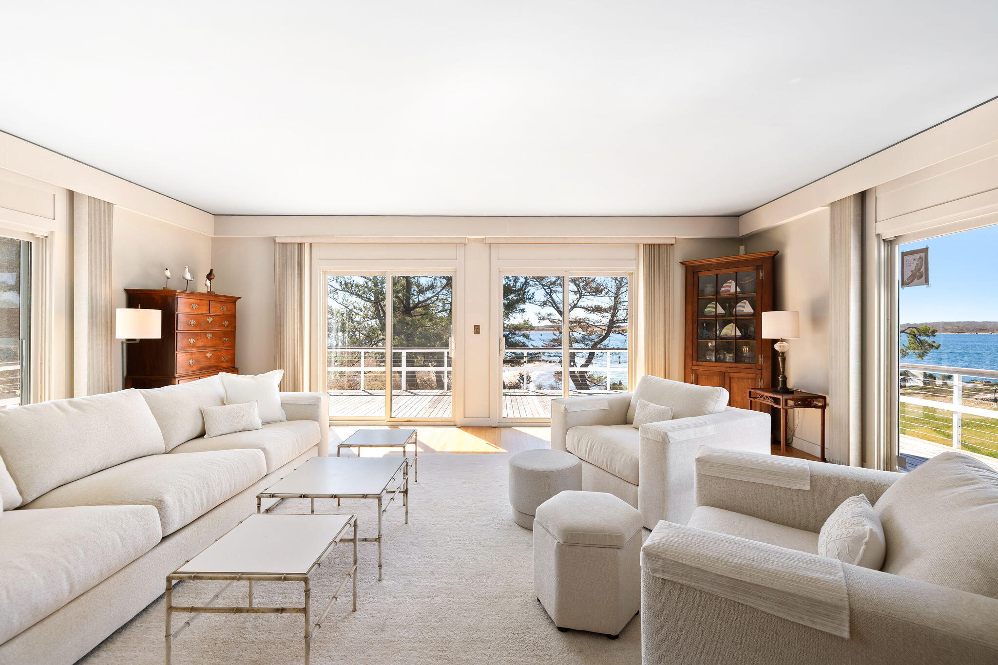 169 Penzance Road Woods Hole, MA 02543 - Photo 12 of 41 a living room with furniture and a large window
