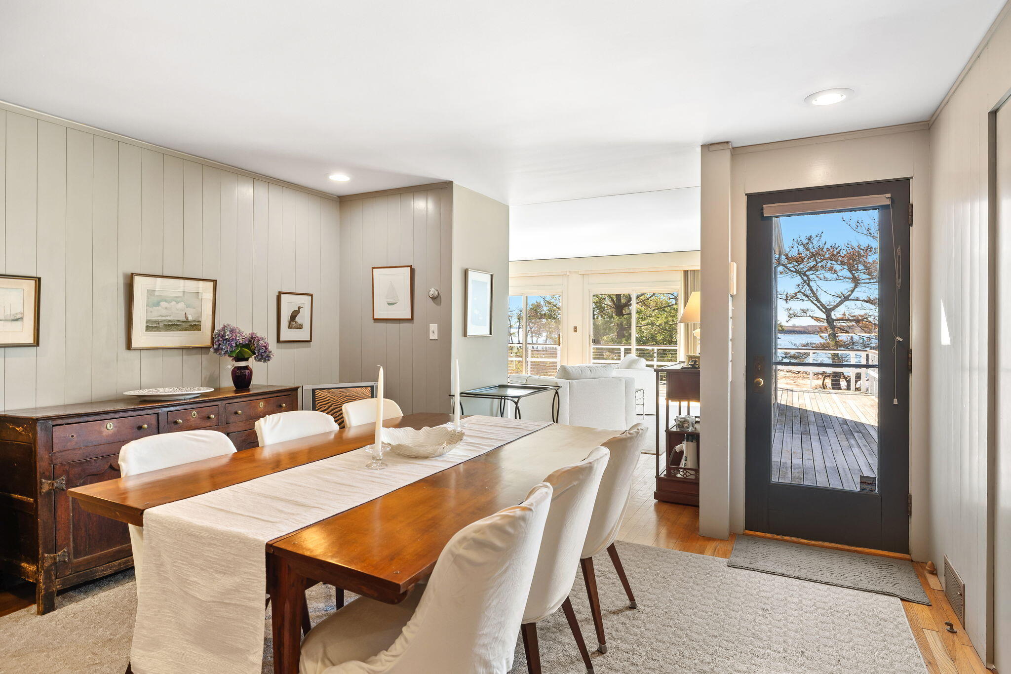 169 Penzance Road Woods Hole, MA 02543 - Photo 15 of 41 a view of a dining room with furniture and wooden floor