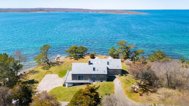 a view of a water with a yard