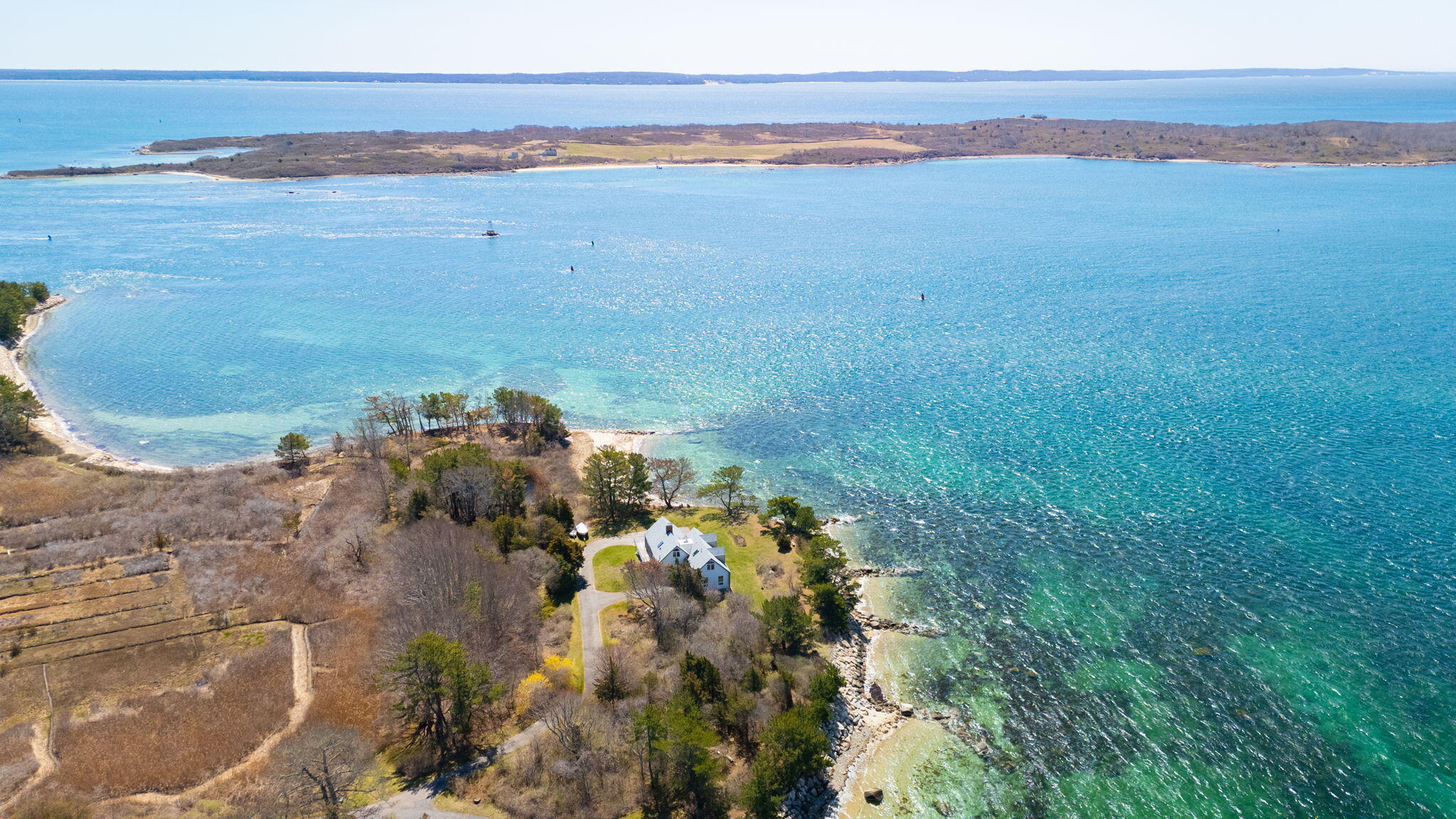 169 Penzance Road Woods Hole, MA 02543 - Photo 3 of 41 a view of an ocean and beach