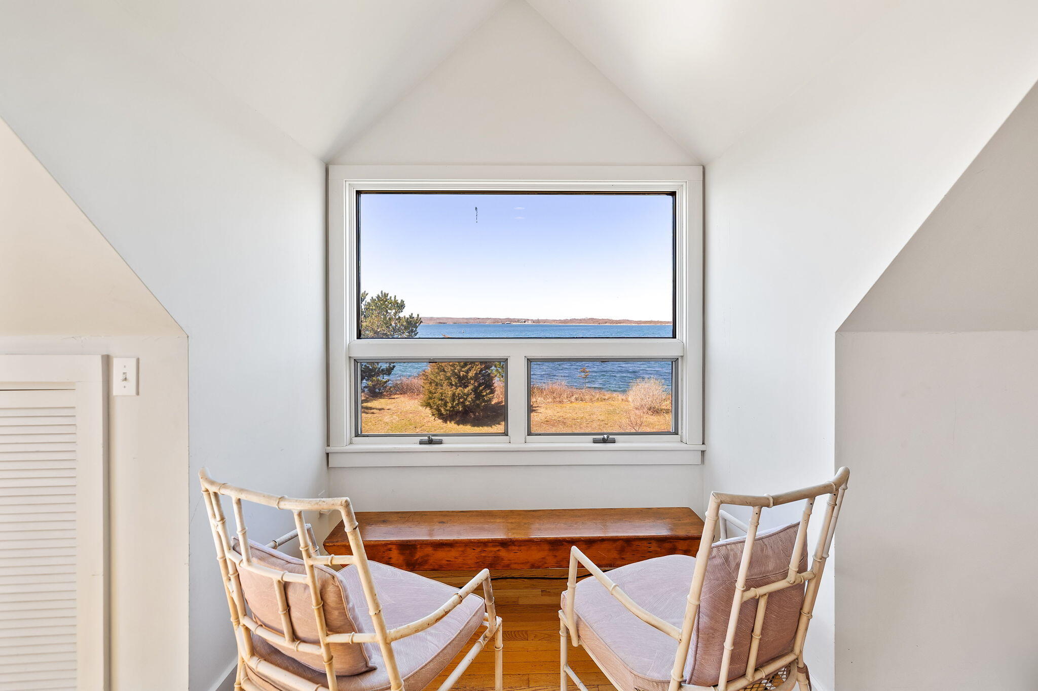 169 Penzance Road Woods Hole, MA 02543 - Photo 31 of 41 a view of a dining room with furniture and a window