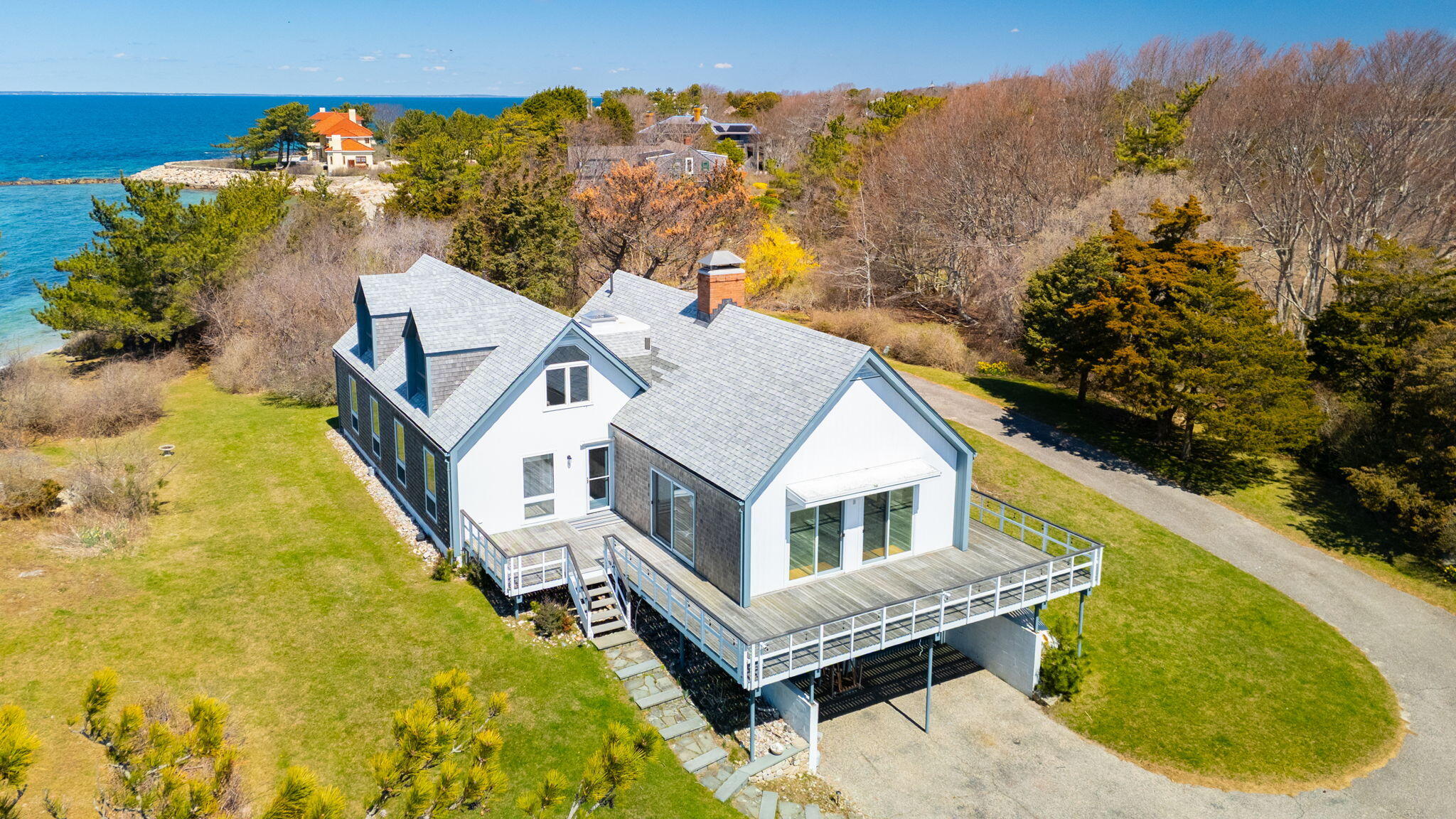 169 Penzance Road Woods Hole, MA 02543 - Photo 5 of 41 a view of a house with a balcony