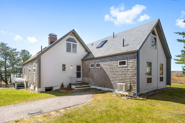 a view of backyard of house