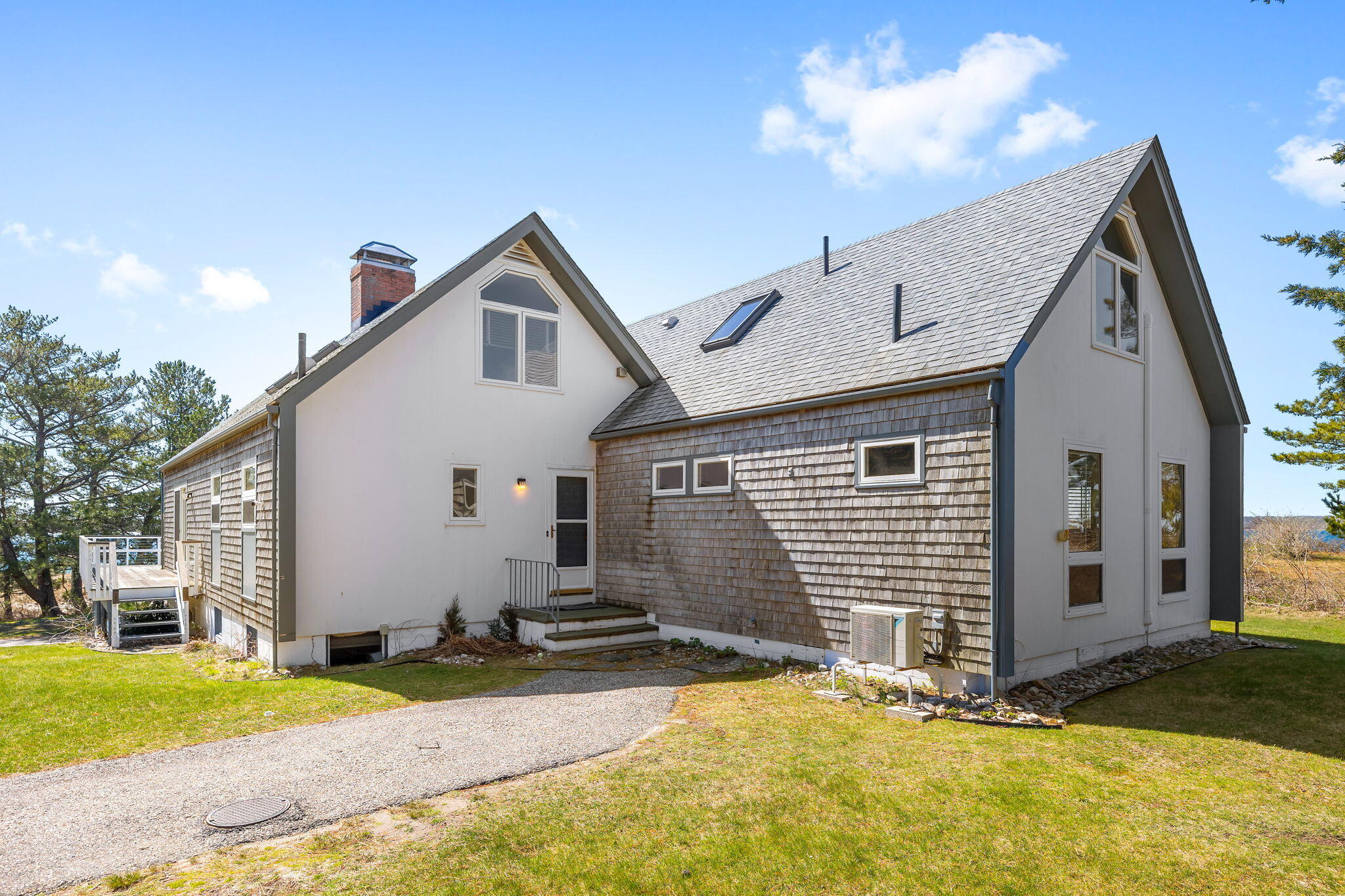 169 Penzance Road Woods Hole, MA 02543 - Photo 7 of 41 a view of backyard of house