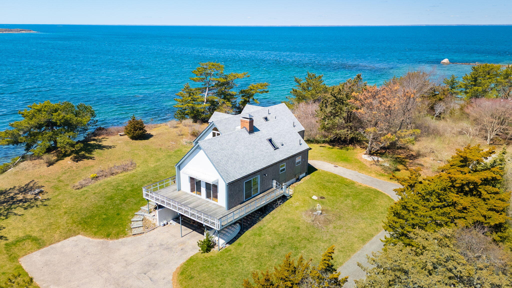169 Penzance Road Woods Hole, MA 02543 - Photo 8 of 41 a view of a house with a ocean view