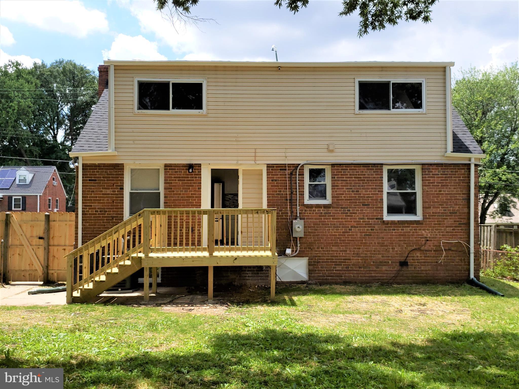 4709 68th Avenue Hyattsville, MD 20784 - Photo 11 of 30 a view of a house with a yard