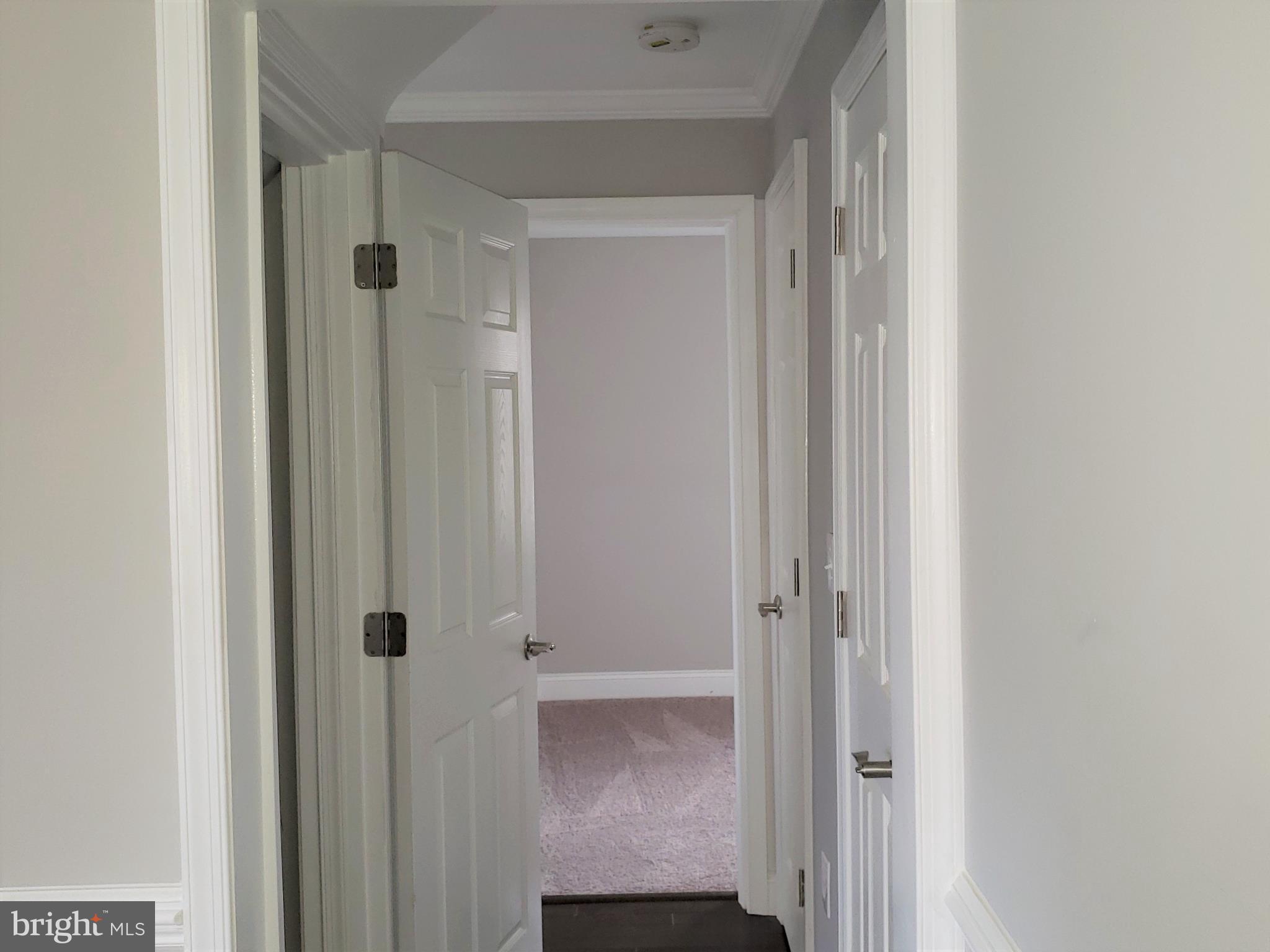 4709 68th Avenue Hyattsville, MD 20784 - Photo 12 of 30 a view of front door with hallway