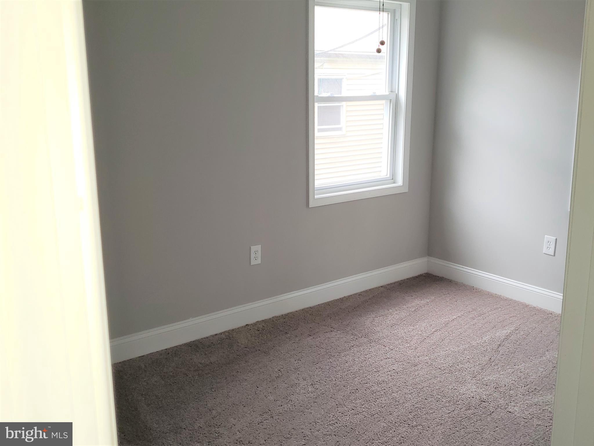 4709 68th Avenue Hyattsville, MD 20784 - Photo 15 of 30 an empty room with a window