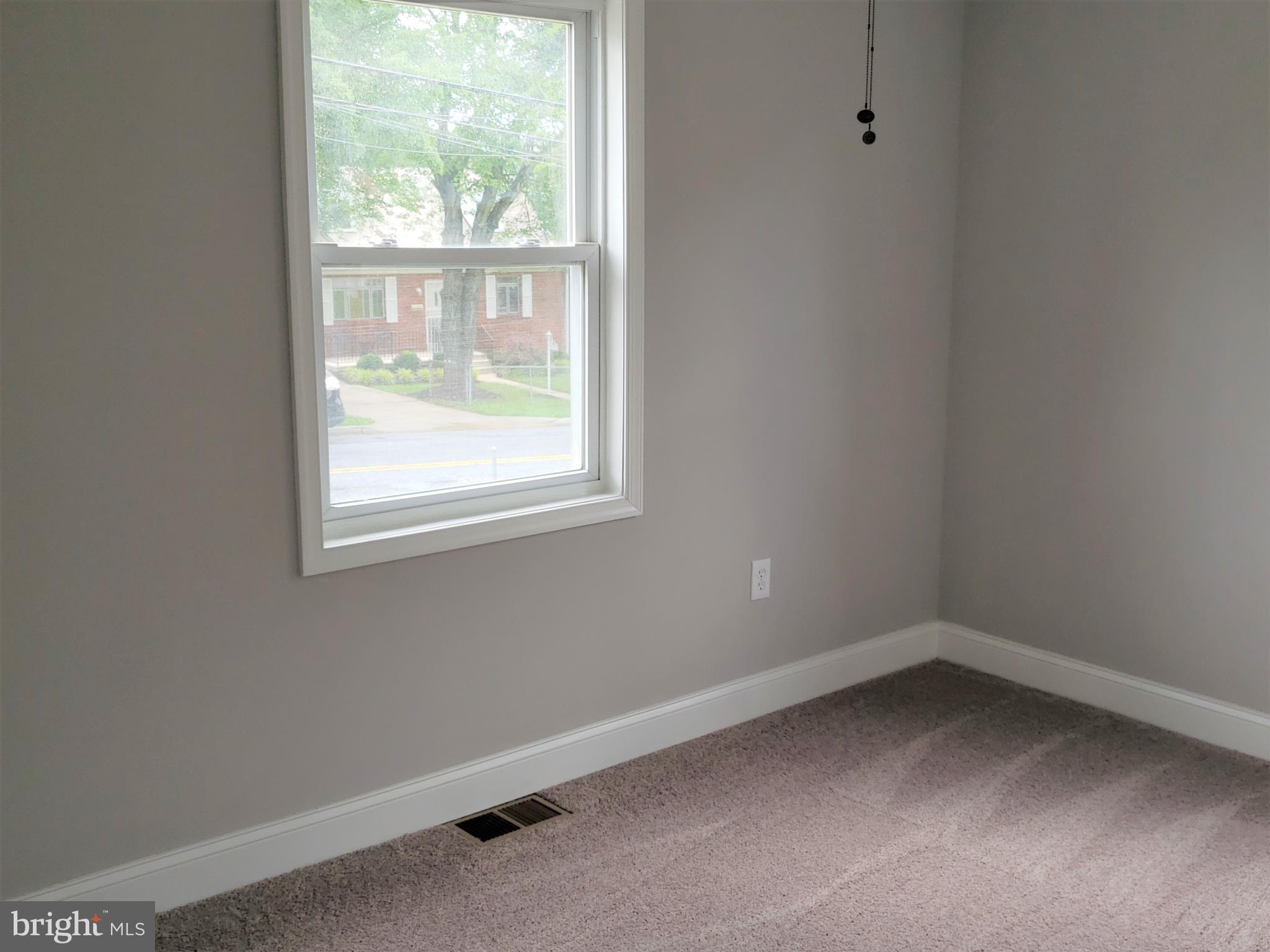 4709 68th Avenue Hyattsville, MD 20784 - Photo 16 of 30 an empty room with a window
