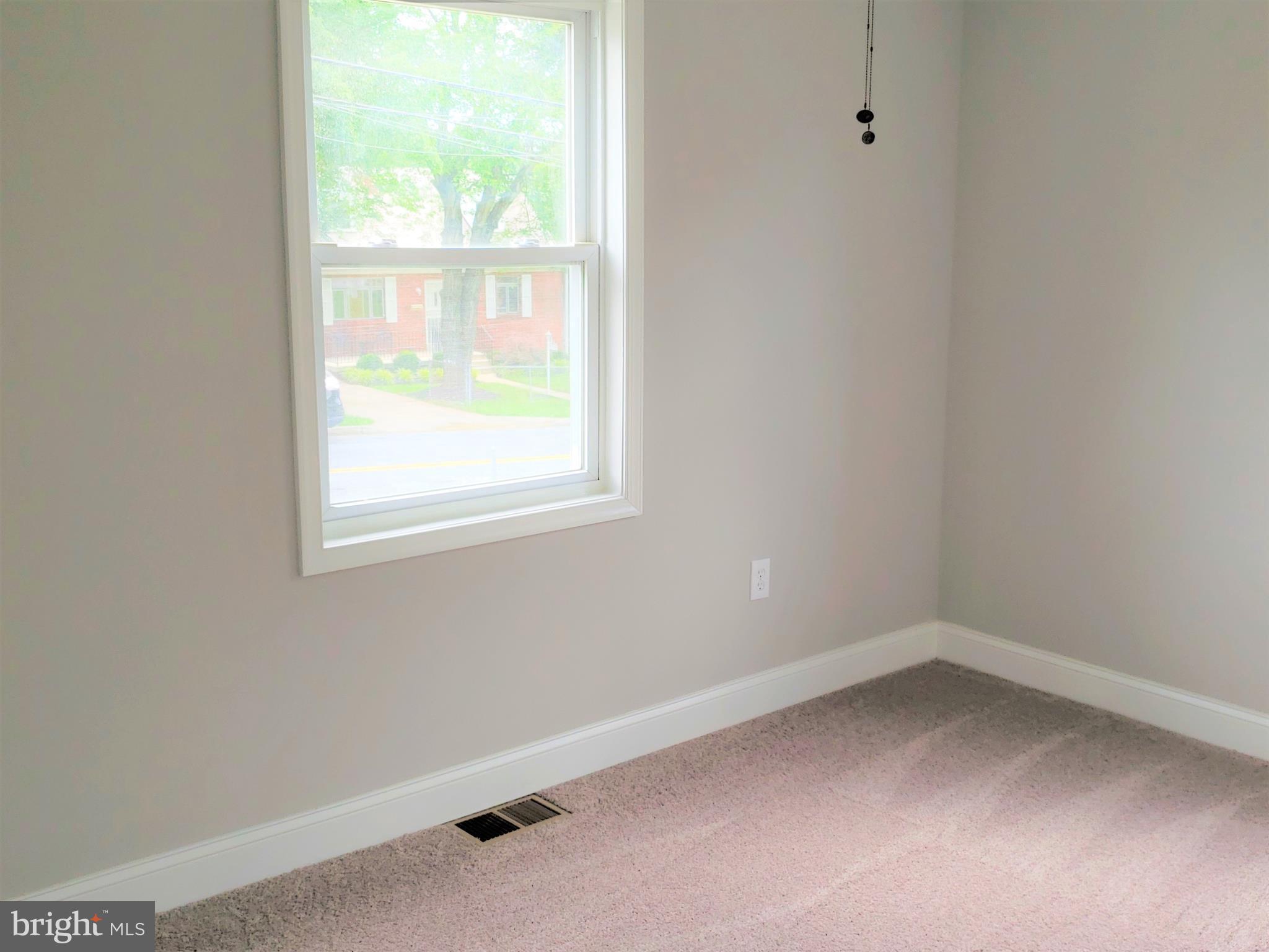 4709 68th Avenue Hyattsville, MD 20784 - Photo 17 of 30 an empty room with a window