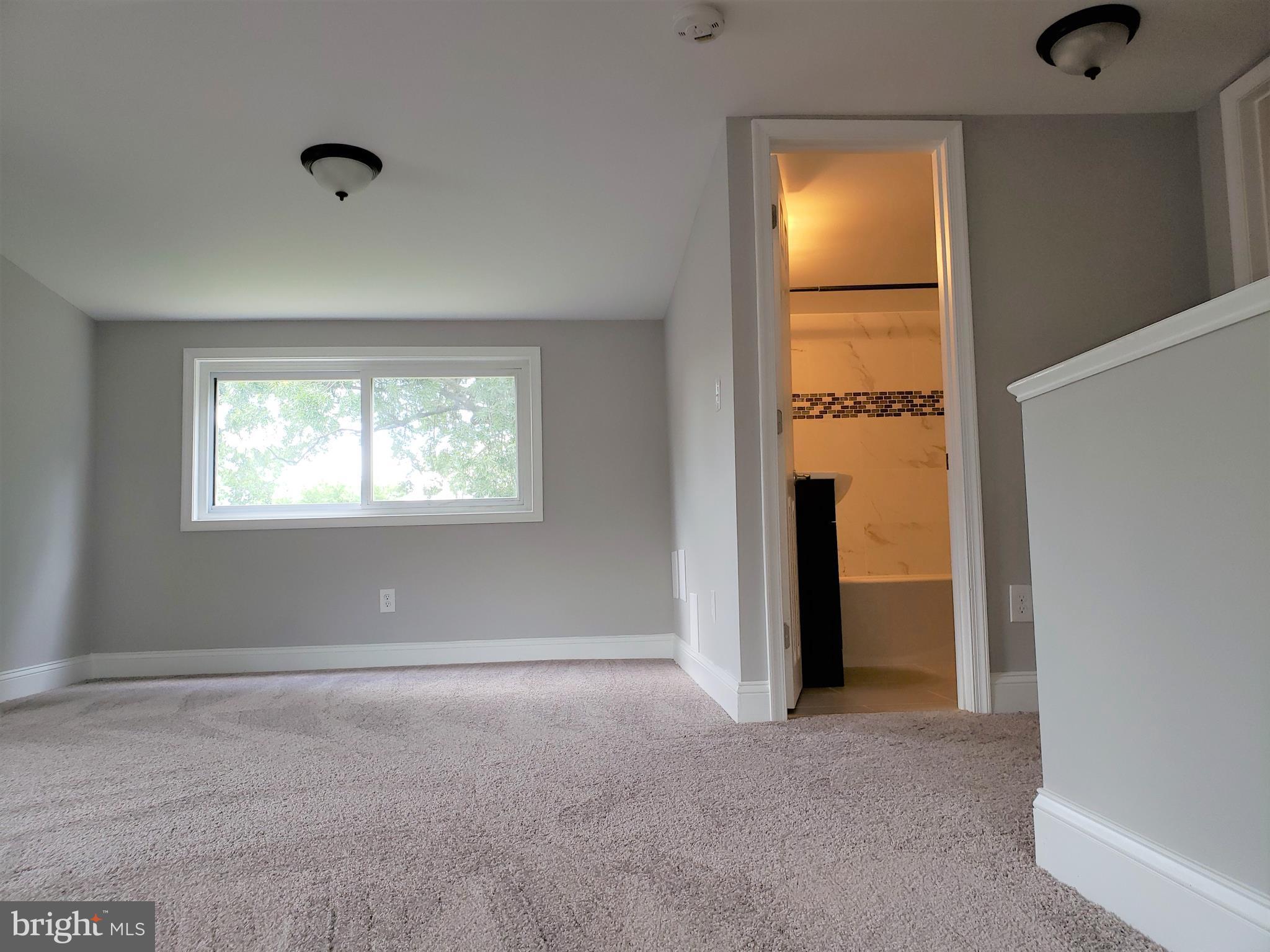 4709 68th Avenue Hyattsville, MD 20784 - Photo 25 of 30 a view of an empty room with a window