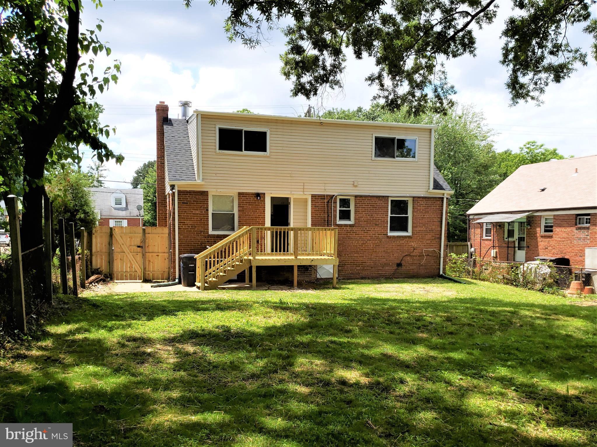 4709 68th Avenue Hyattsville, MD 20784 - Photo 10 of 30 a view of a house with a yard