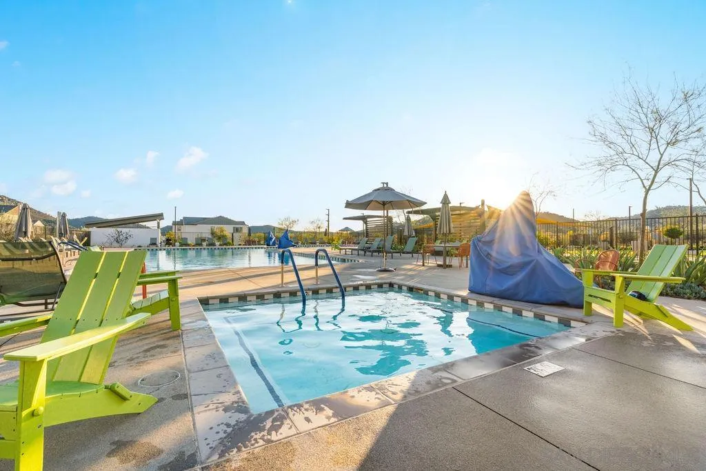 347 Sweet Place Fallbrook, CA 92028 - Photo 5 of 33 a view of a swimming pool and lounge chairs